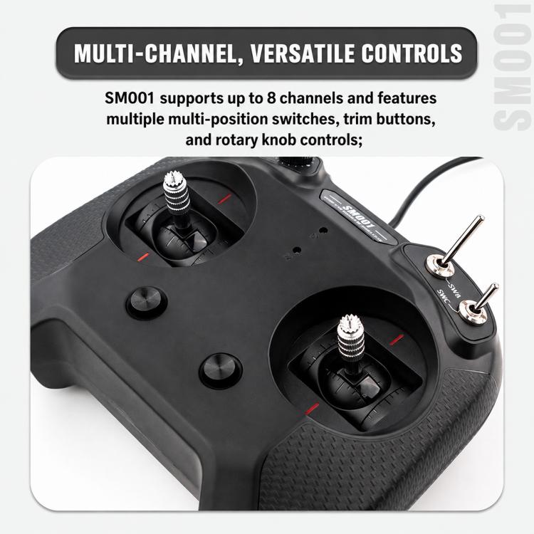 Black RC flight simulator controller close-up with rotary knobs, switches, and USB cable