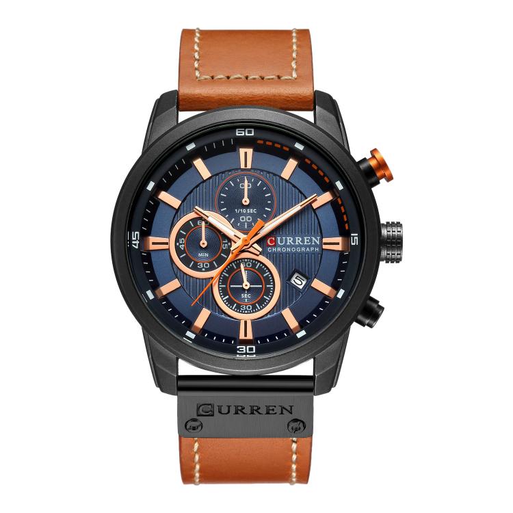 Men’s chronograph wrist watch with dark blue dial, black case, and tan vegan leather band