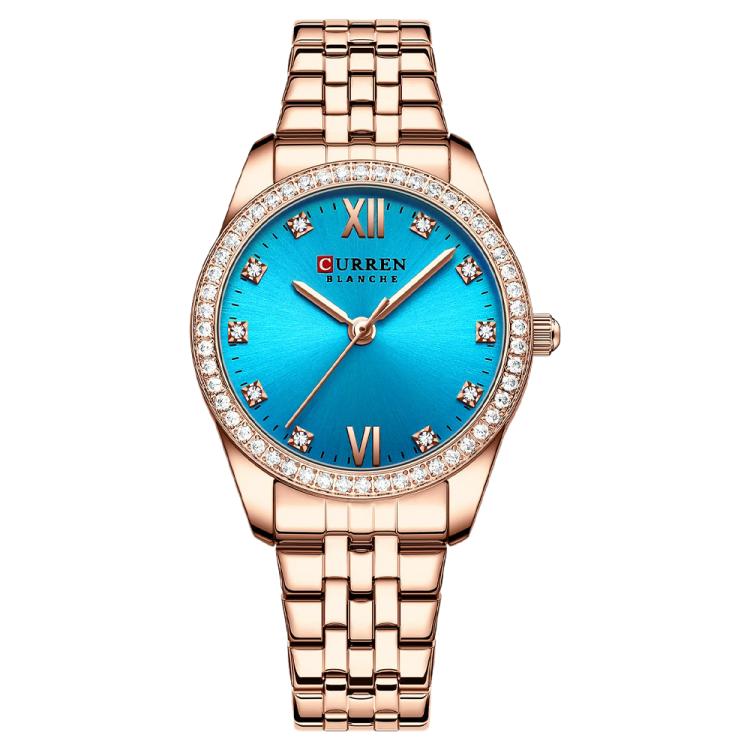 Women’s rose gold quartz watch with blue dial, rhinestone bezel, and metal bracelet
