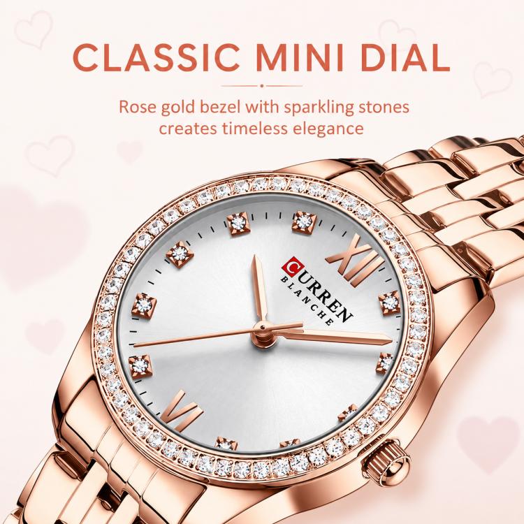 Women’s rose gold quartz watch with white dial, rhinestone bezel, and metal bracelet