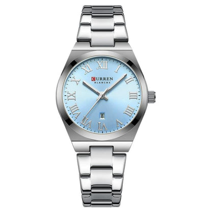 Women’s stainless steel quartz watch with light blue dial and date window, silver tone.