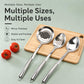 Stainless steel utensil set with perforated skimmer, soup spoon and ladle on wood tray