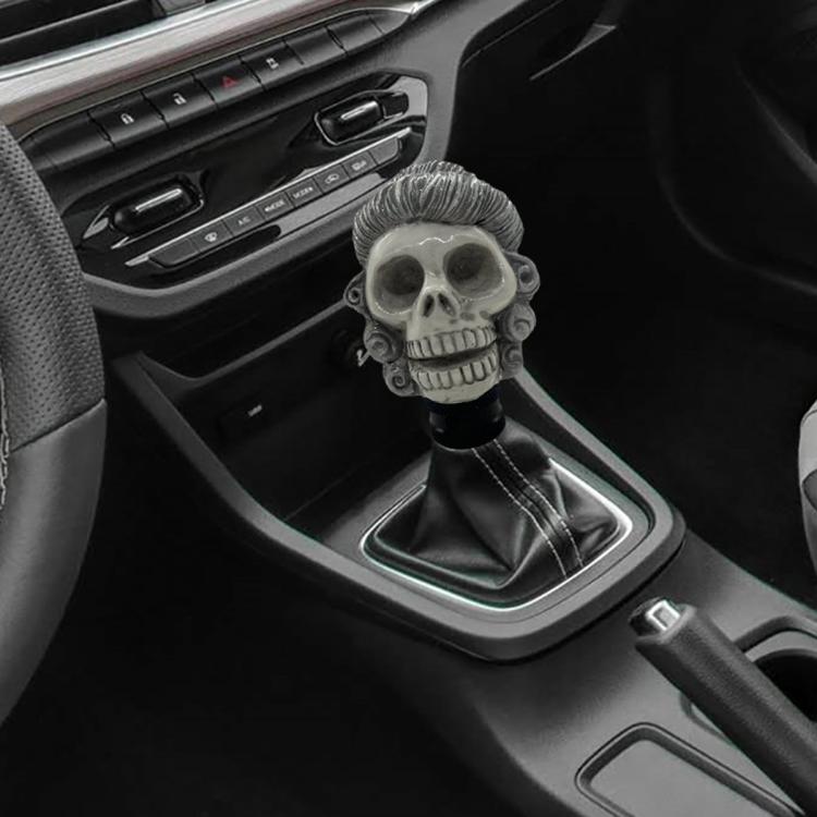 Gray skull-style manual gear shift knob with detailed face design