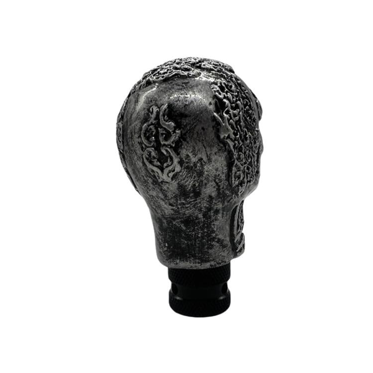Black skull-style manual gear shift knob with textured face design
