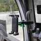 Grey truck phone holder with green silicone pads and anti-slip clamping arms
