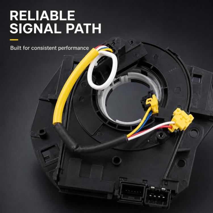 Black clock spring spiral cable assembly with yellow wiring, white loop, and connector plugs