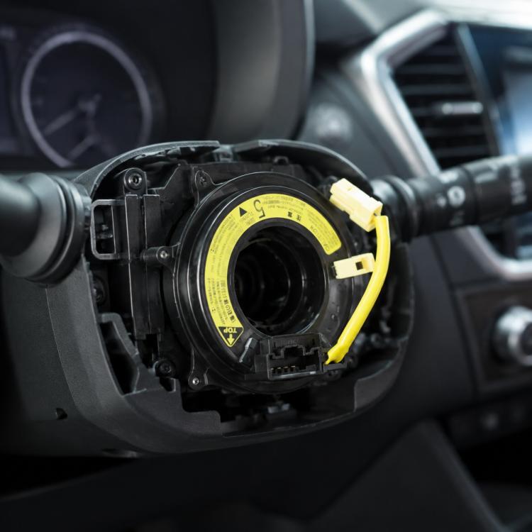 Car steering wheel clock spring spiral cable with yellow airbag connector, black housing