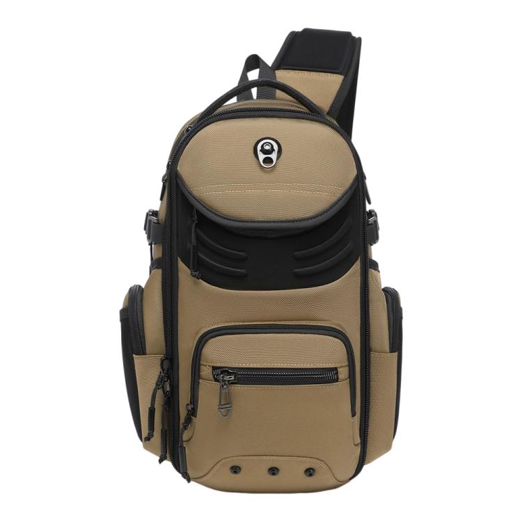 Tan and black men's large utility chest sling bag with front zip pocket and adjustable strap.