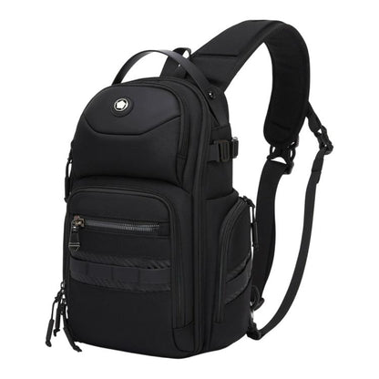 Black crossbody chest bag with top handle, adjustable strap, and front zip pockets.