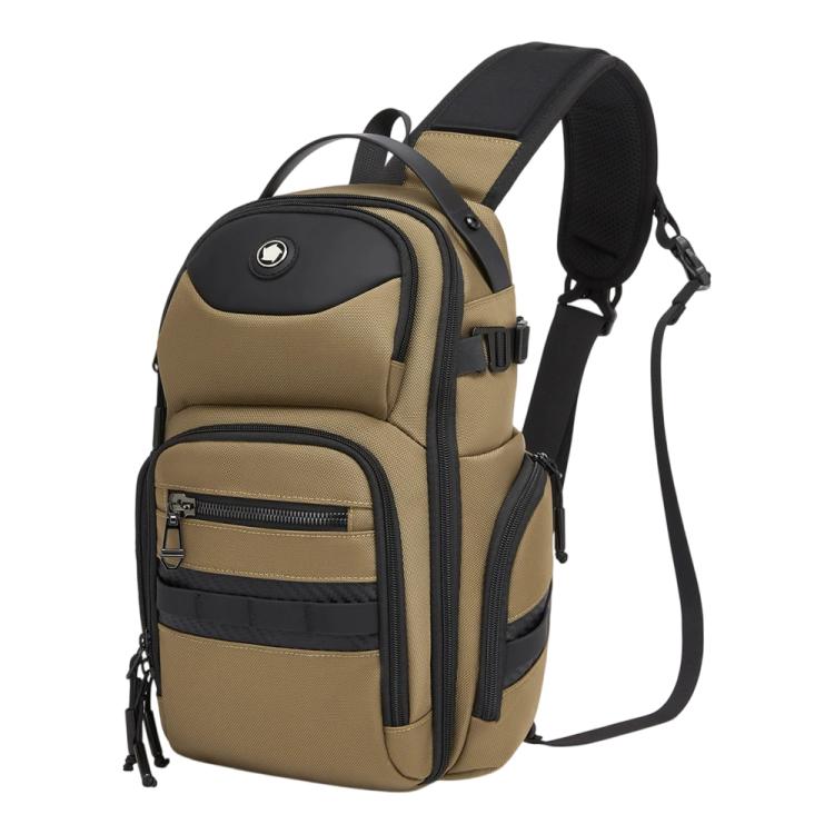 Brown crossbody chest bag with adjustable strap and front zip organizer panels.