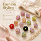 Assorted resin disc buttons with gold shanks and loops, mixed colors, glossy finish