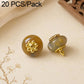 Amber resin flat flower-shank buttons with gold decorative flower tops, 2 shown