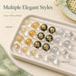 Tray set of gold foil glass bead knot buttons in gold, silver, and black-gold finishes