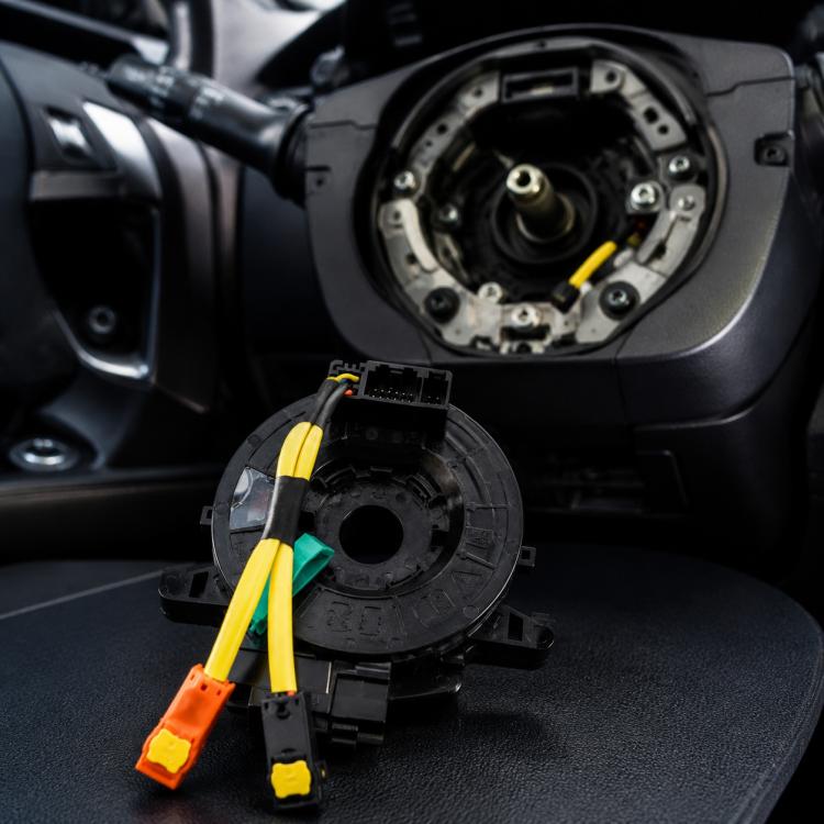 Steering wheel clock spring spiral cable with yellow, orange, green wire connectors