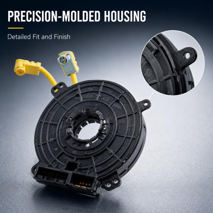 Clock spring spiral cable with black molded housing and visible connector terminals