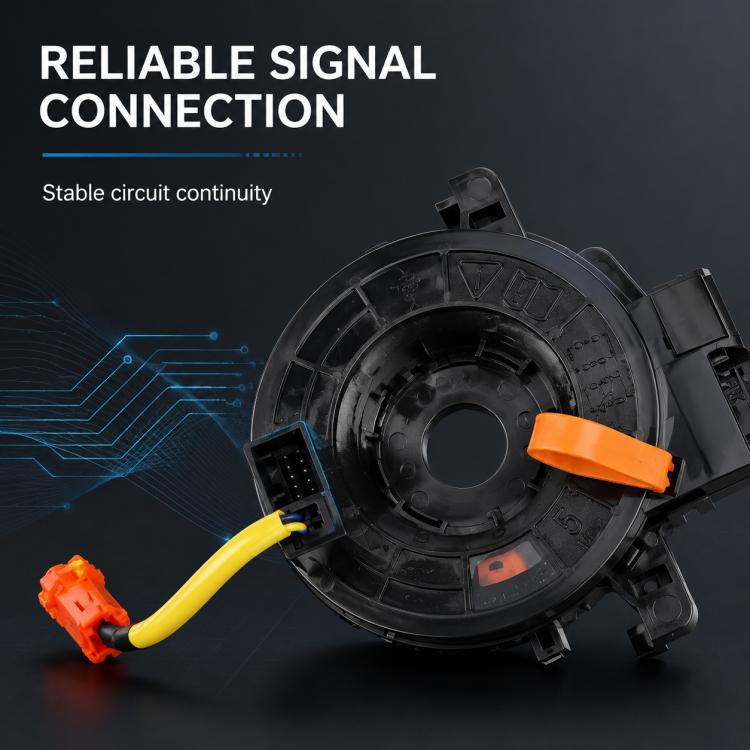 Clock spring spiral cable with orange tab and yellow wire, electronics detail