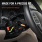 Airbag clock spring assembly mounted near steering wheel with yellow lead