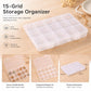 Clear 15-compartment plastic storage organizer box with integrated hinged lid, closed