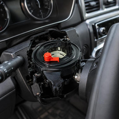 Car steering wheel airbag clock spring spiral cable with red release tab, black housing