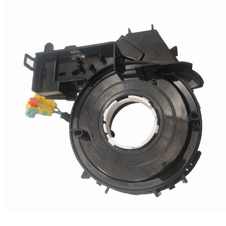 Car steering wheel clock spring spiral cable, front view with circular housing and wiring