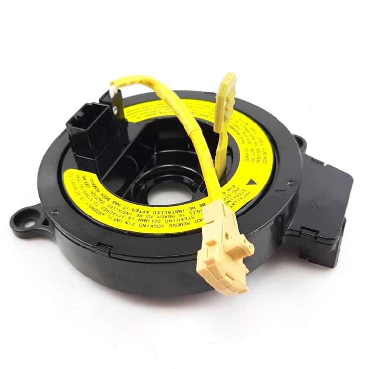 Car steering wheel clock spring with yellow cable and black multi-connector housing