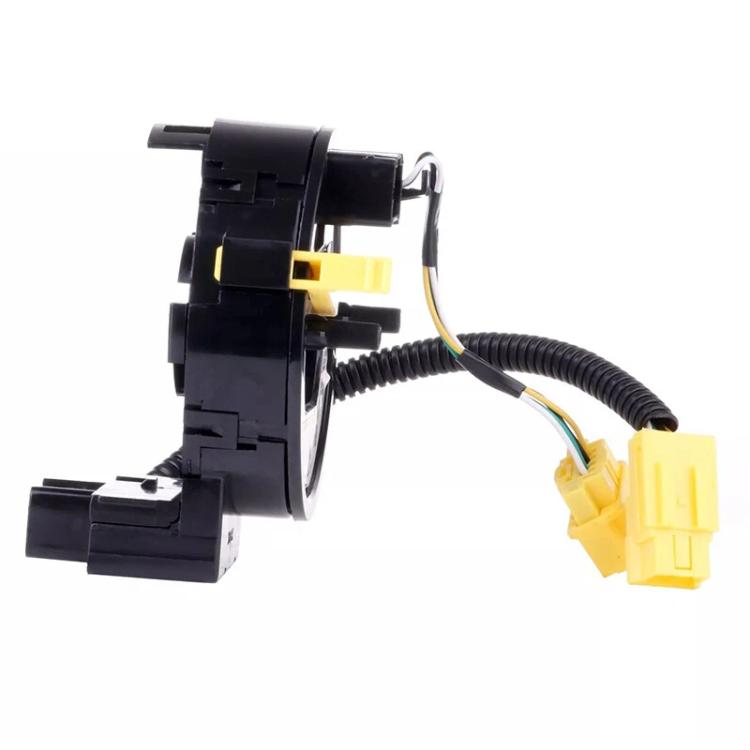 Steering wheel clock spring spiral cable, black unit with yellow plugs and coiled wire lead
