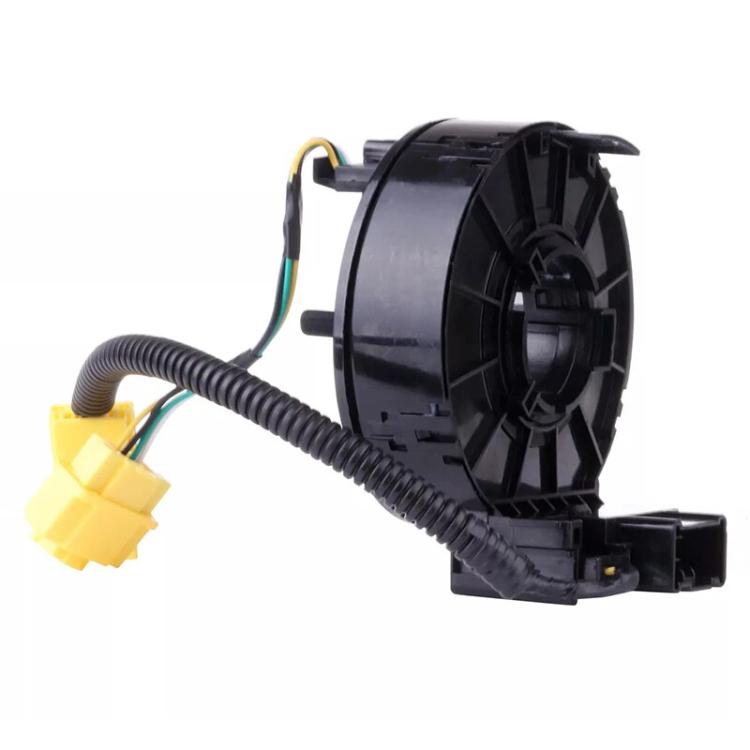 Steering wheel clock spring spiral cable, black housing with coiled cable and yellow electrical plugs