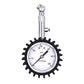 Silver metal tire pressure gauge with white dial, black gear-style protective cover