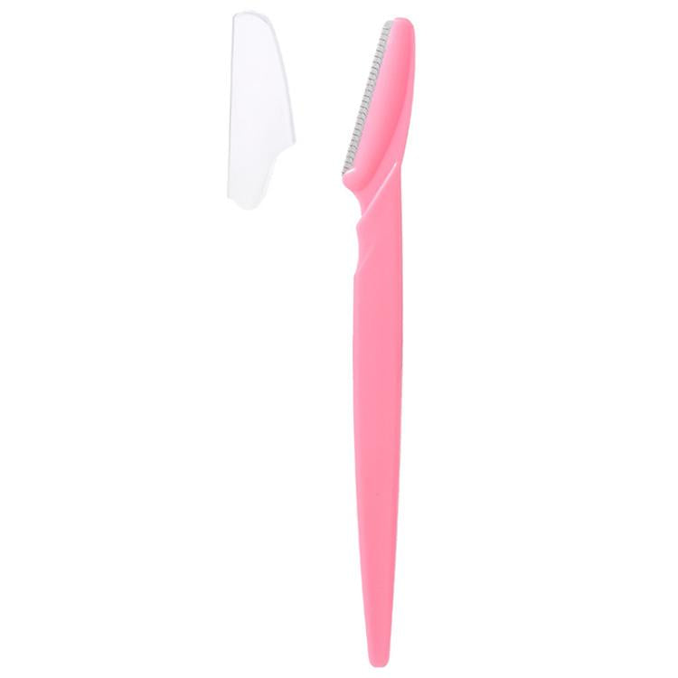Pink eyebrow razor with white anti-cut safety guard and toothed blade edge.