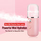 Pink portable facial mist sprayer with translucent head and mist effect