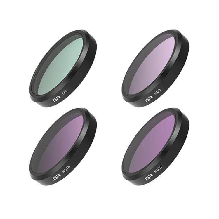 Quick-release camera lens filter set with dark rings and green or purple tinted glass