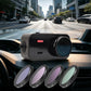 Camera with dark lens filter discs, including round teal and purple tinted filter rings