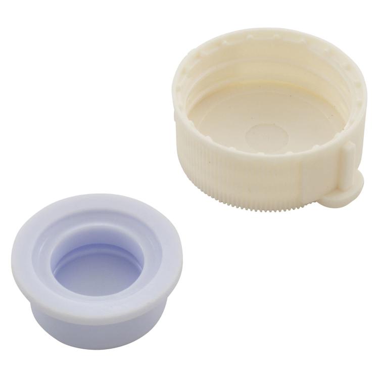 Round pool exhaust valve cover and light purple valve plug, underside view with opening