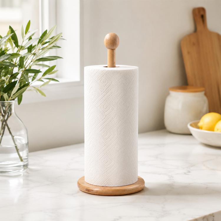 Bamboo tissue roll holder with ball-topped post, white roll, and wooden base