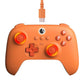 Orange wired youth gaming controller with glowing RGB thumbstick and face button lights
