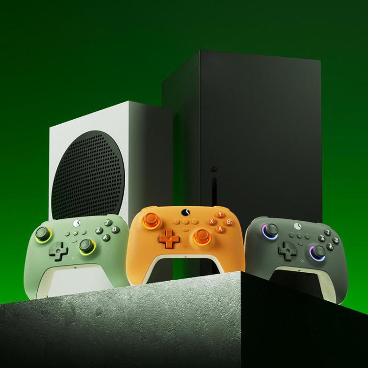 RGB gaming controller set showing green, orange, and gray controllers in a group