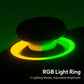 Gaming controller RGB light ring glowing yellow and green on a dark shell