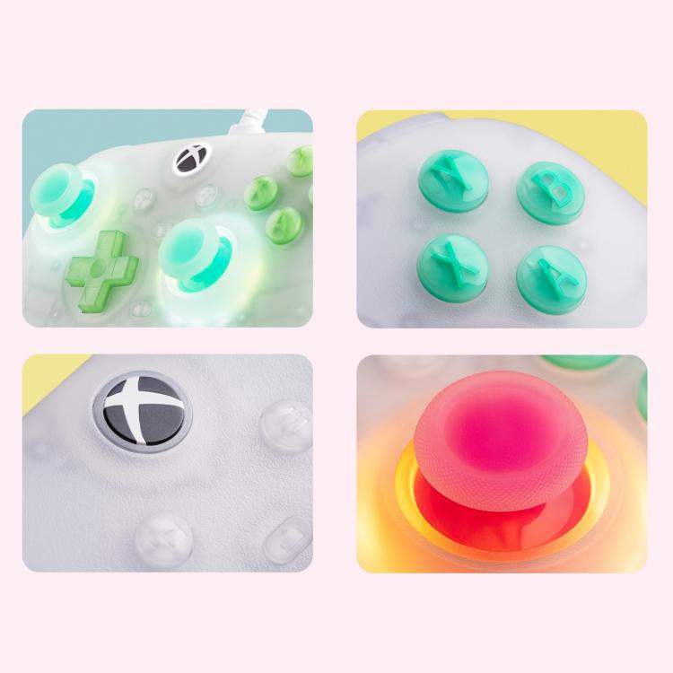 Colorful translucent buttons and glowing thumbstick tops on a gaming controller