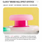 Translucent pink thumbstick with white textured cap on a gaming controller
