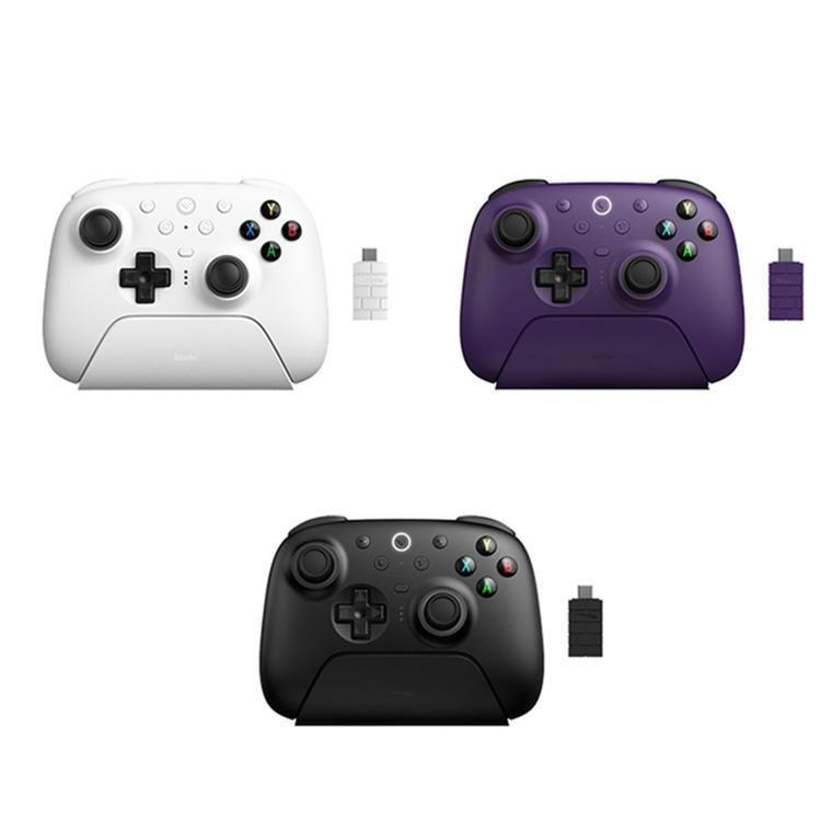 Wireless gamepad color options: white, purple, and black, each with charging dock