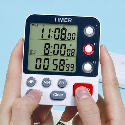 Dual countdown timer clock with LCD display, white base, dark blue top, and three buttons