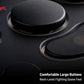 Arcade controller detail showing two large black buttons with soft textured caps