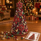Beaded Christmas tree decoration with red poinsettia-style accents and pearl bead details