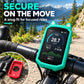 Teal green silicone cat-ear GPS cover mounted on a bicycle handlebar