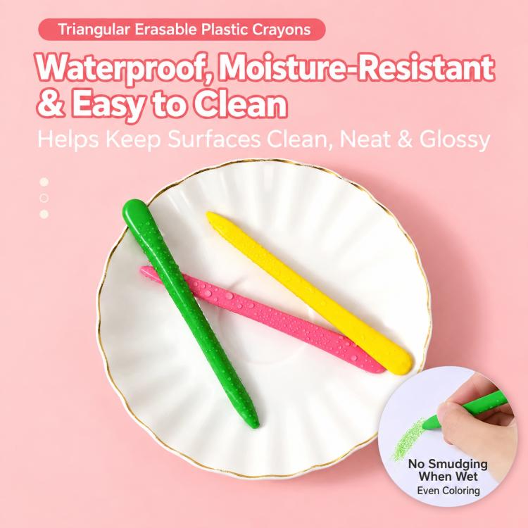Waterproof triangular erasable plastic crayons, green yellow pink on white plate
