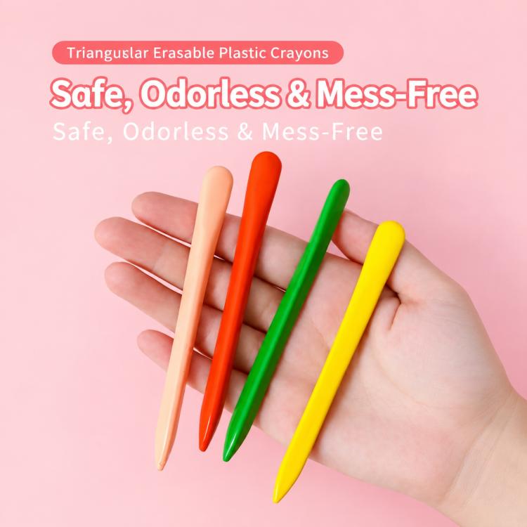 Hand holding triangular erasable plastic crayons, orange red green yellow colors