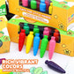 Close-up of boxed carrot crayon set with multicolor crayons and a few loose crayons