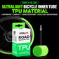 Green TPU bicycle inner tube with Presta valve, shown with retail box