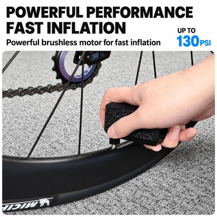 Hand using compact electric inflator nozzle on bicycle tire valve.