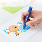 Hand holding a palm crayon coloring a cute character on paper